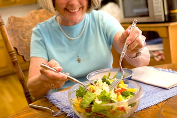 17229-a-woman-eating-a-fresh-salad-pv.jpg